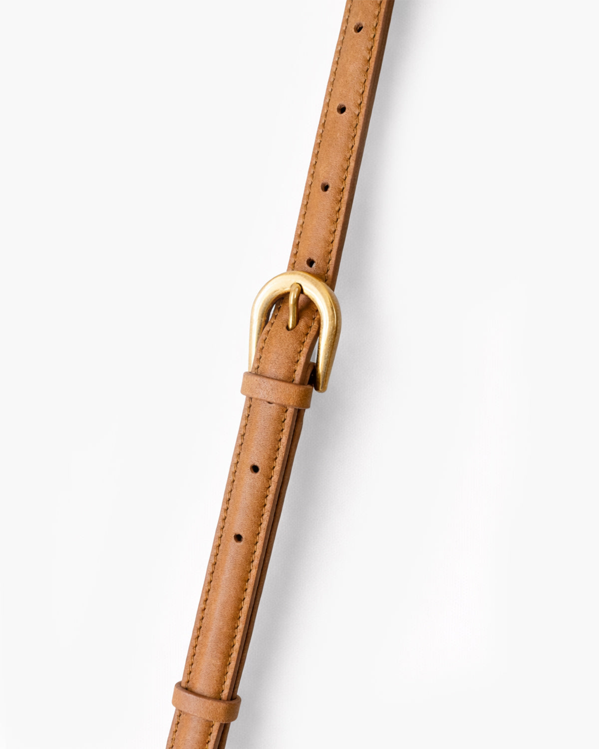 Brown leather belt with a gold buckle on a white background