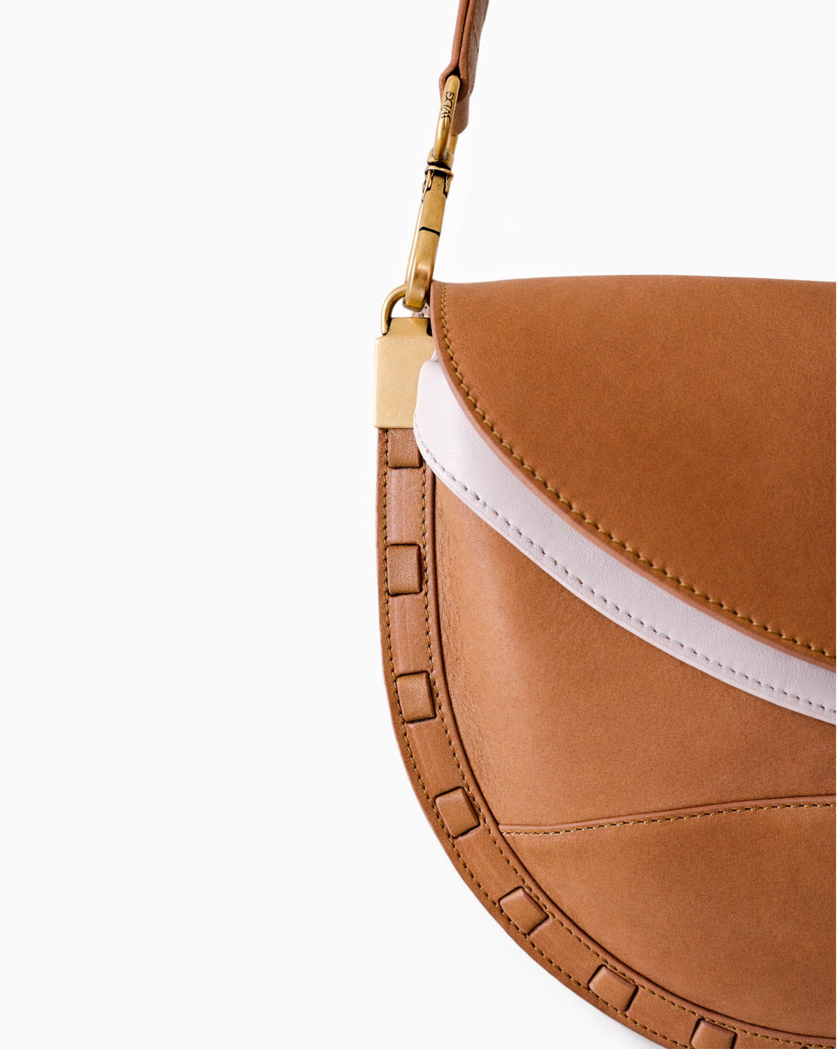 Brown leather handbag with gold clasp on a white background