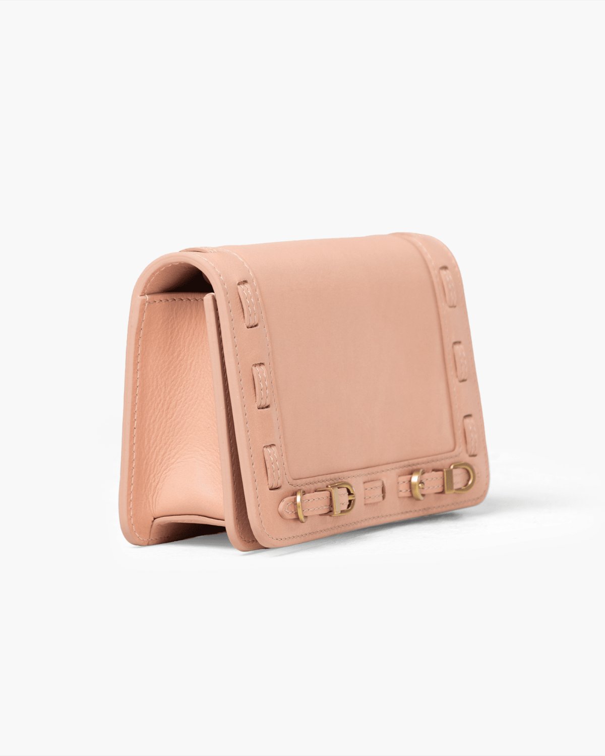 Pink leather wallet with brass accents on a white background