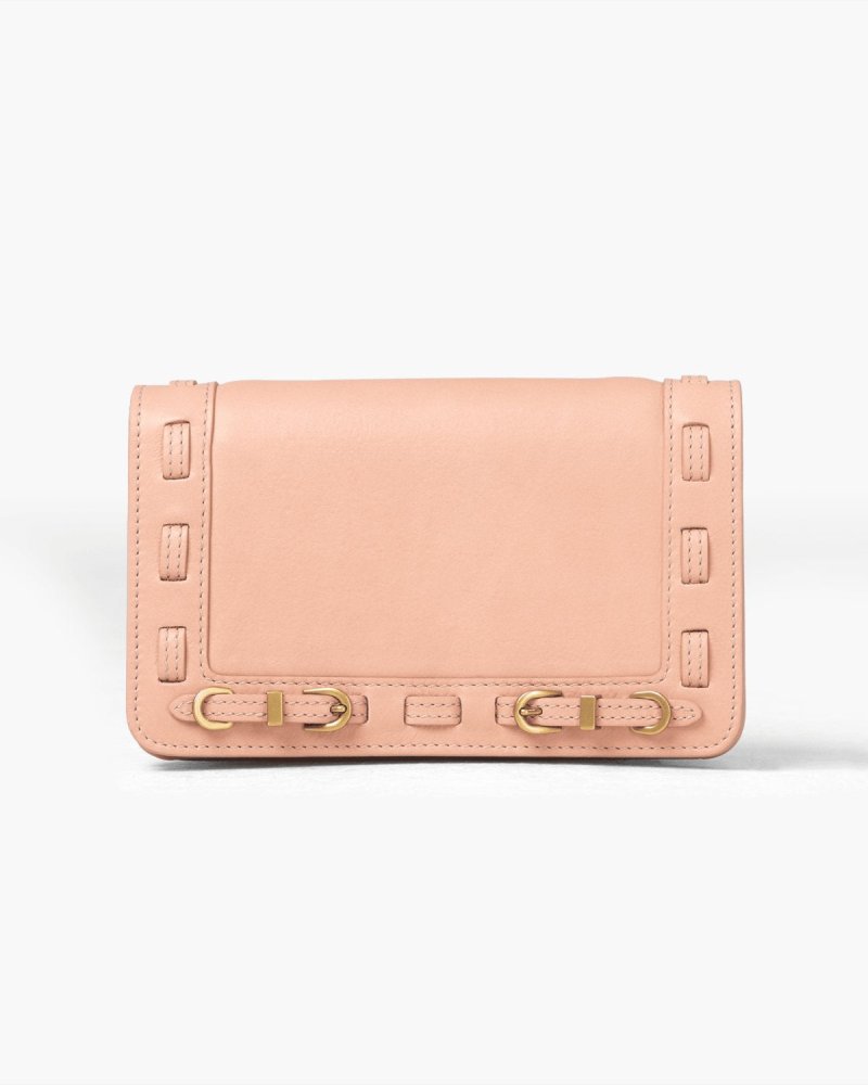Pink wallet with brass accents on a white background