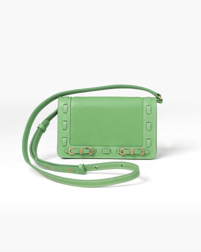 Green handbag with a strap on a white background