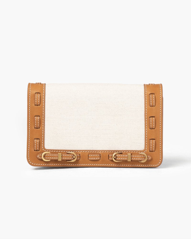 Handbag with light linen panel, brown leather accents on a white background