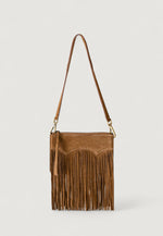 Brown suede handbag with fringe on a light gray background