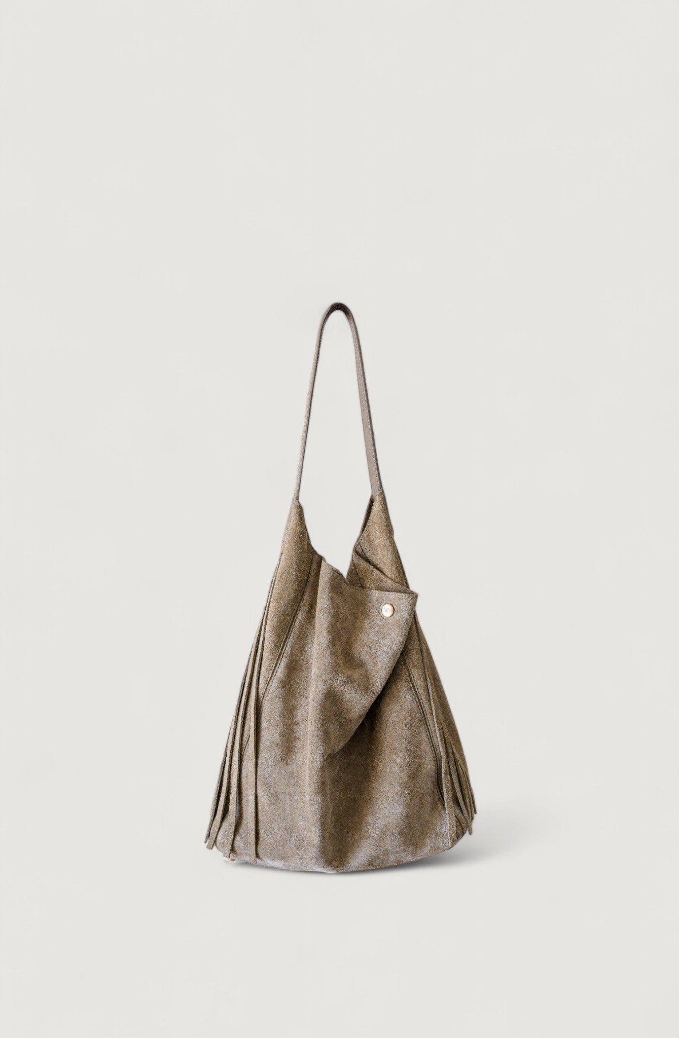 Gray leather handbag with a strap on a light gray background
