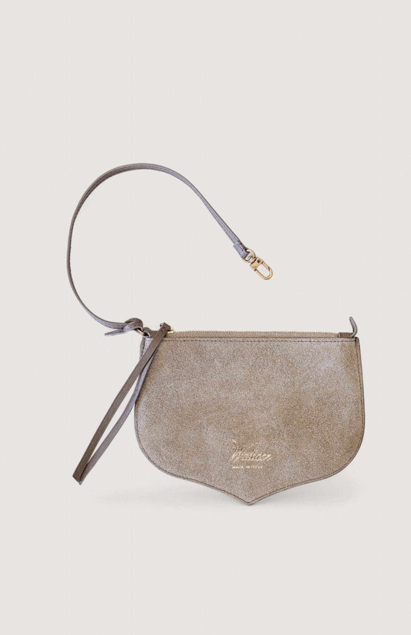 Gray handbag with a strap on a light gray background
