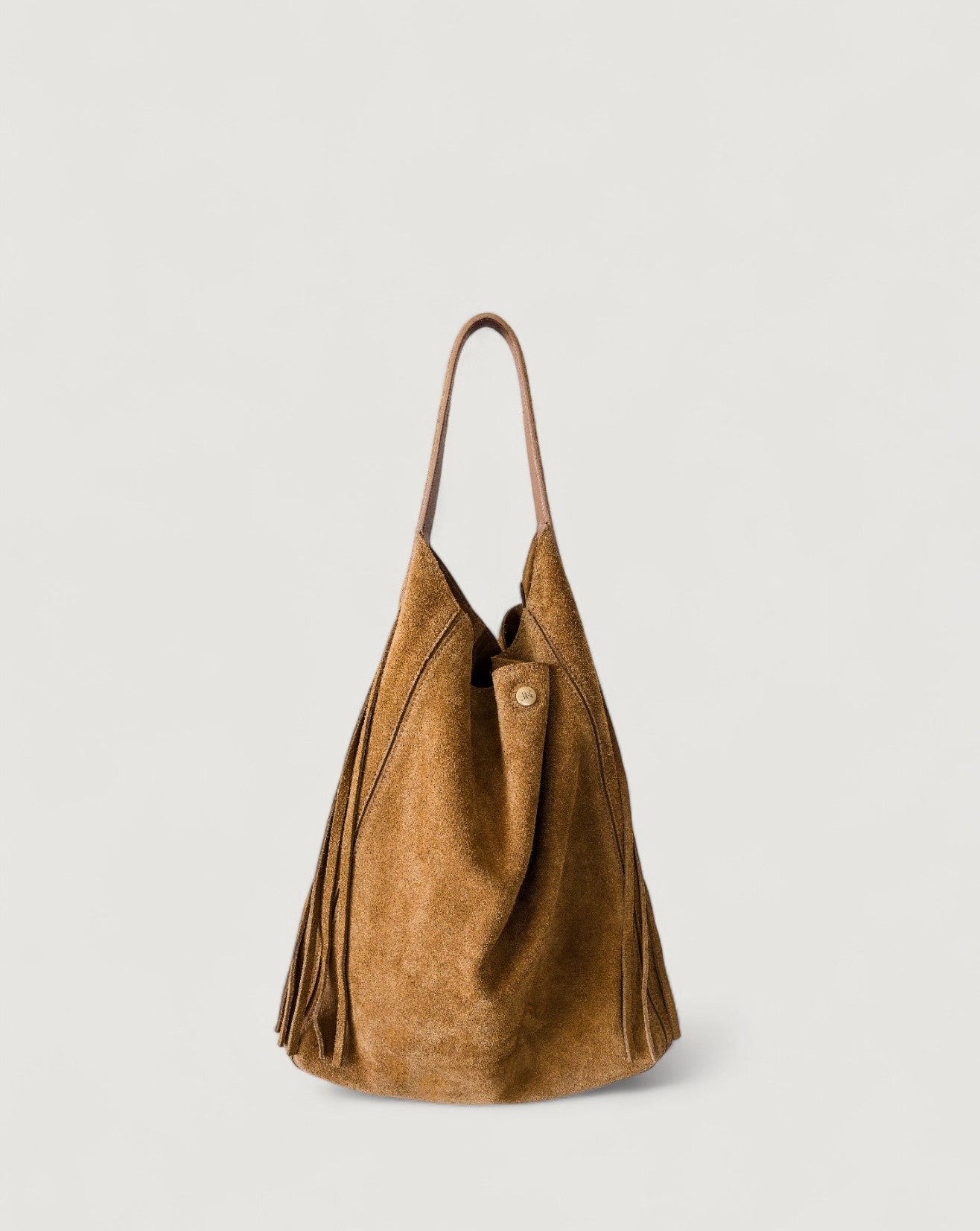 Brown suede handbag on a light gray background