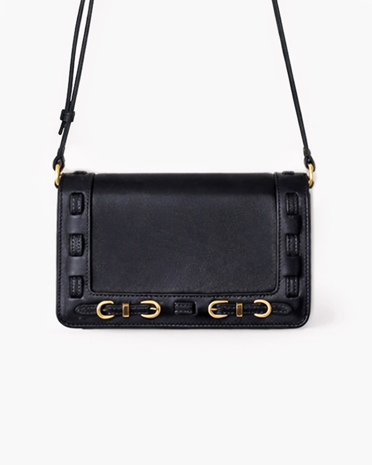 Black handbag with gold accents on a white background