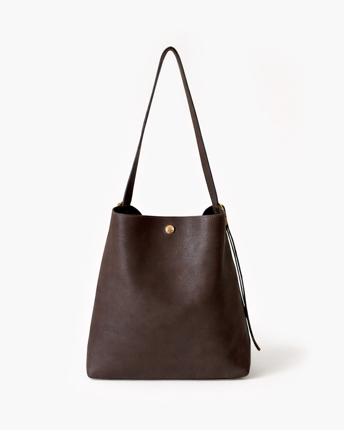 Brown leather handbag with a strap on a white background
