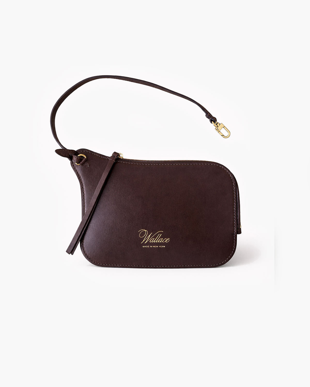 Brown leather handbag with a strap on a white background